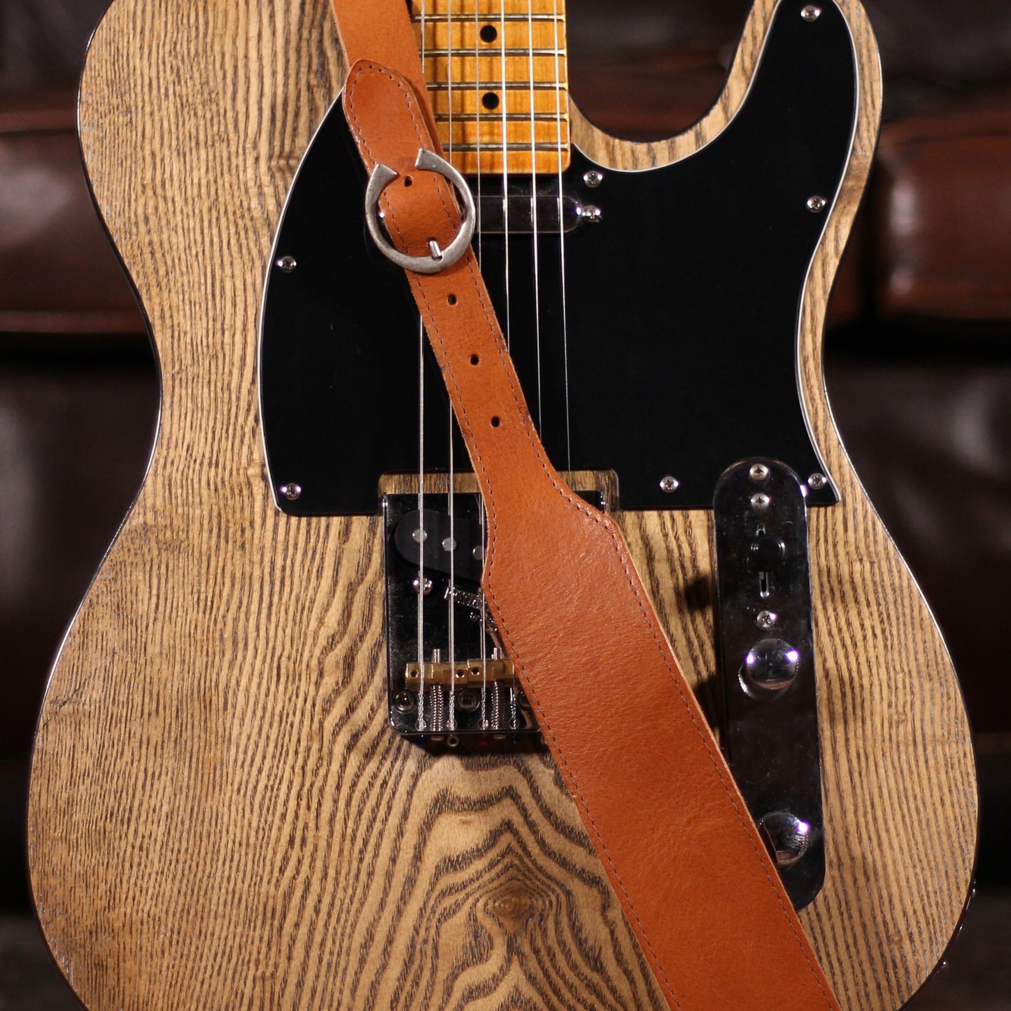 Stones Deluxe Buckles Leather Strap Tan - Straps available at Foulds Guitars Derby