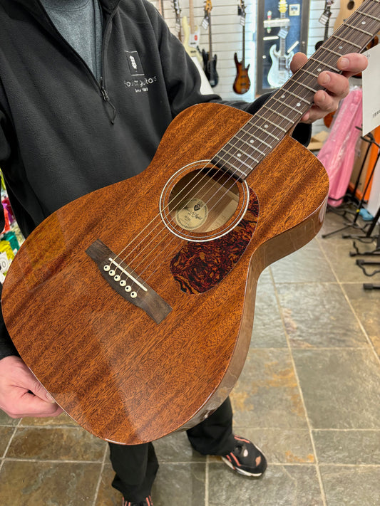 Handing over a guitar to demo