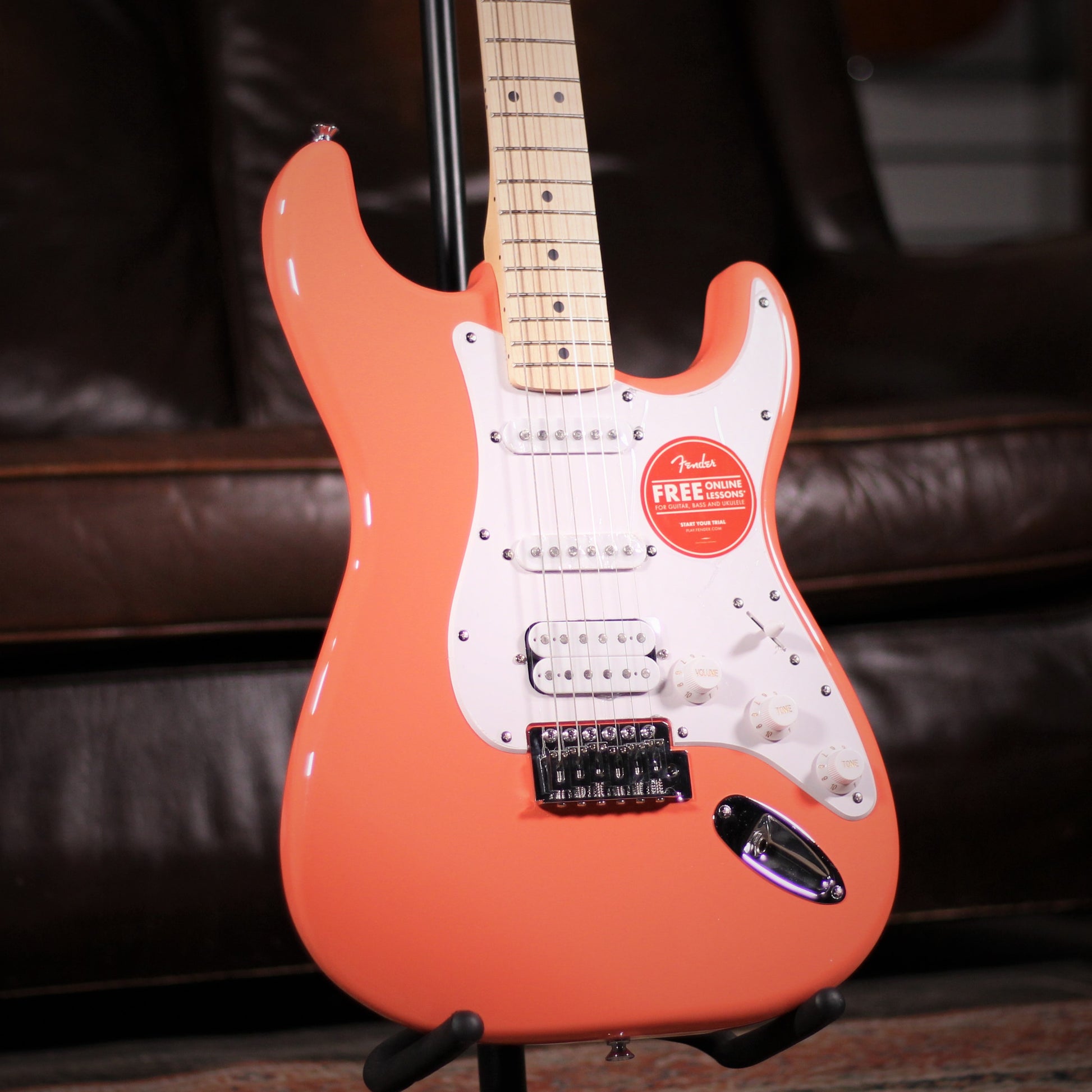Squier Sonic Stratocaster HSS Tahitian Coral angled