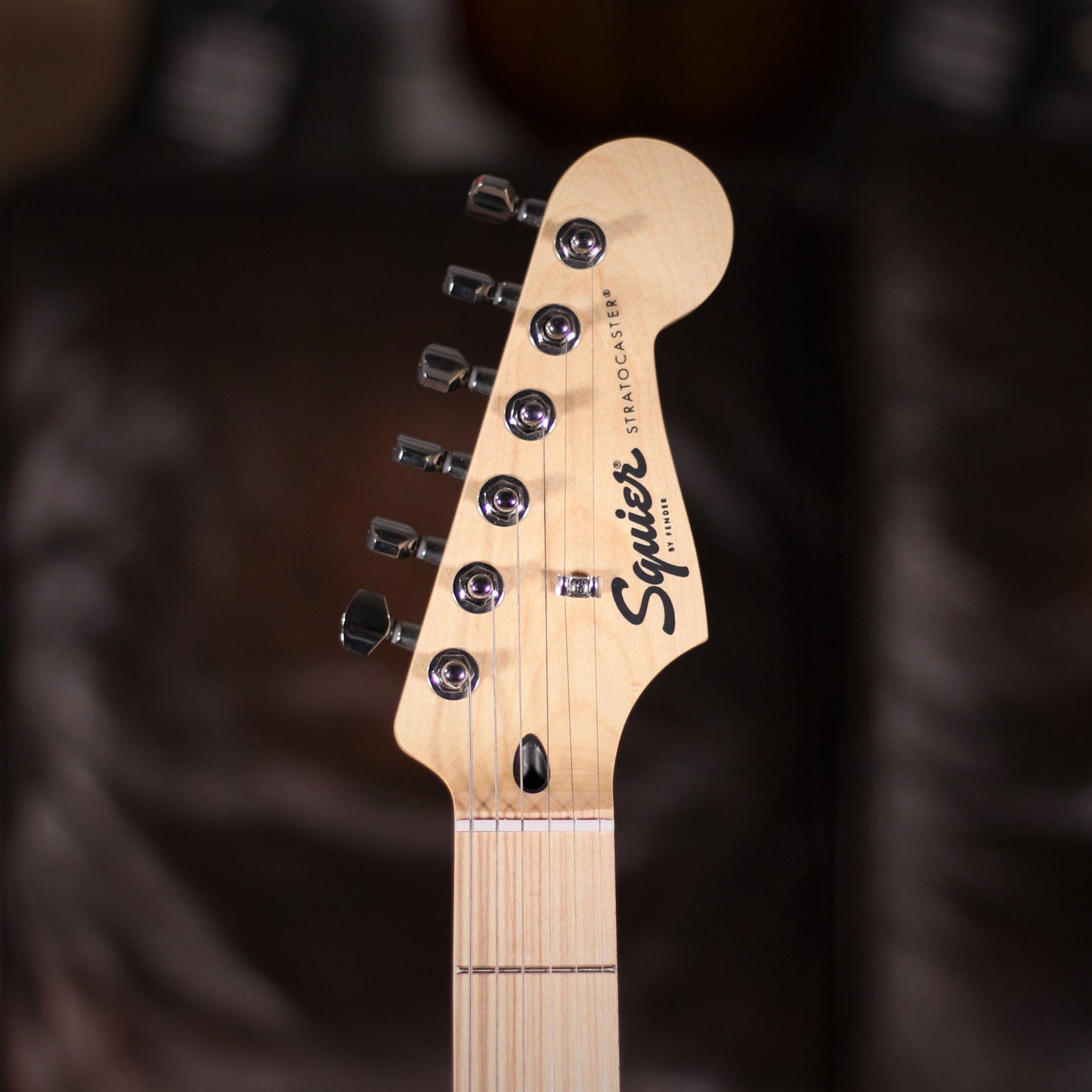 Squier Sonic Stratocaster HSS Tahitian Coral headstock